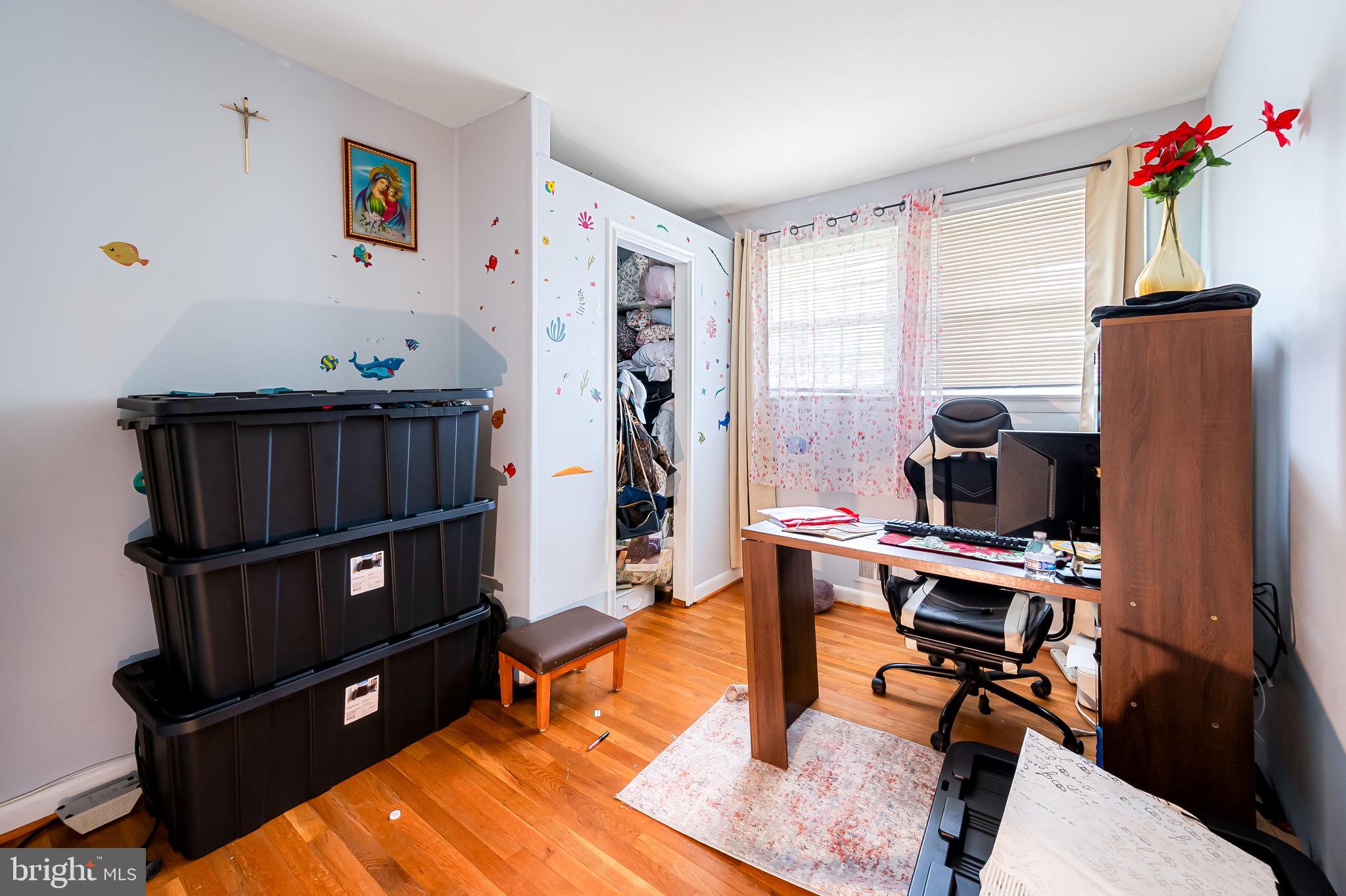 1202 Dunoon Court Silver Spring, MD 20903 - Photo 14 of 23 a view of workspace with wooden floor and window