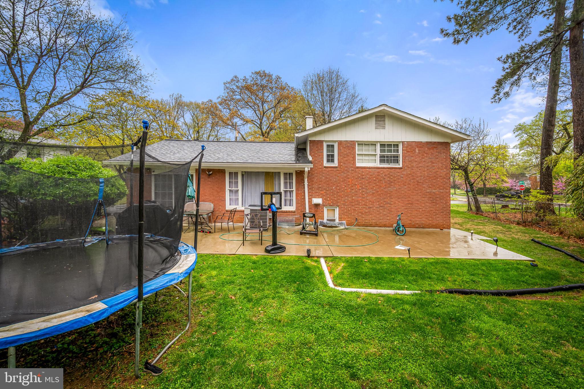 1202 Dunoon Court Silver Spring, MD 20903 - Photo 22 of 23 a front view of a house with garden