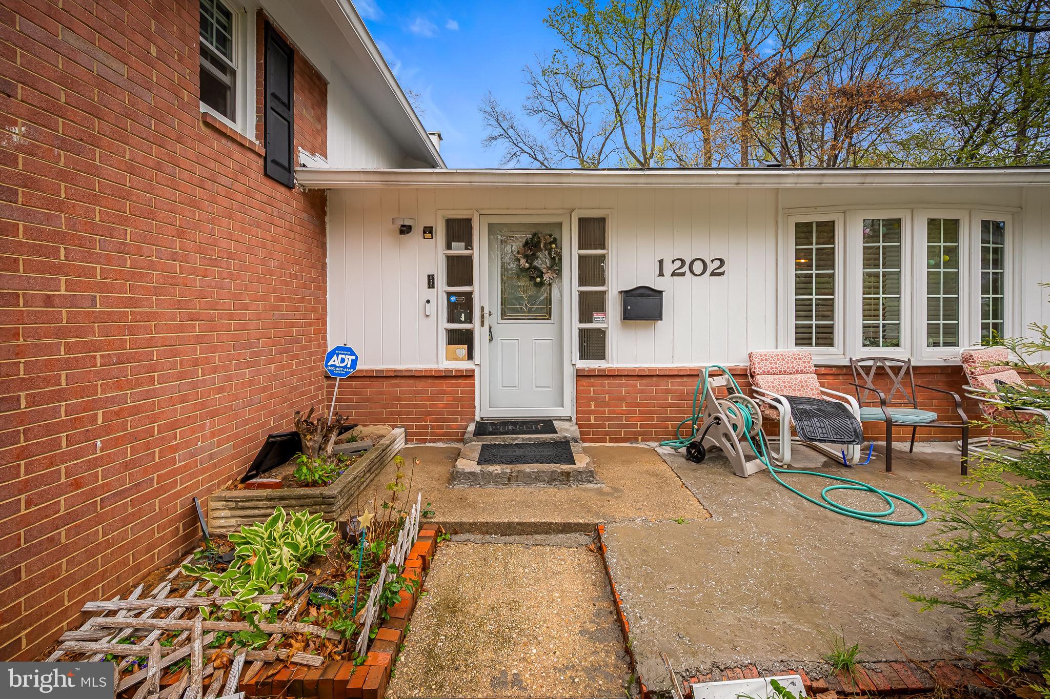 1202 Dunoon Court Silver Spring, MD 20903 - Photo 3 of 23 a view of a house with sitting area
