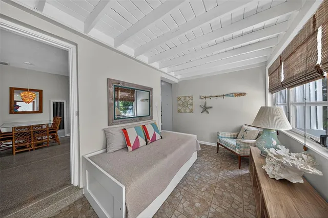 a living room with furniture and a table