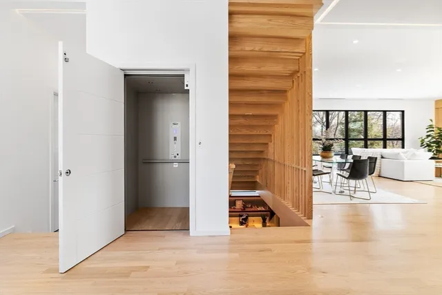 a view of a living room and entry way