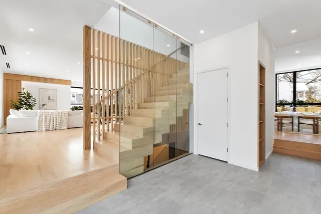 a view of entryway with livingroom and wooden floor