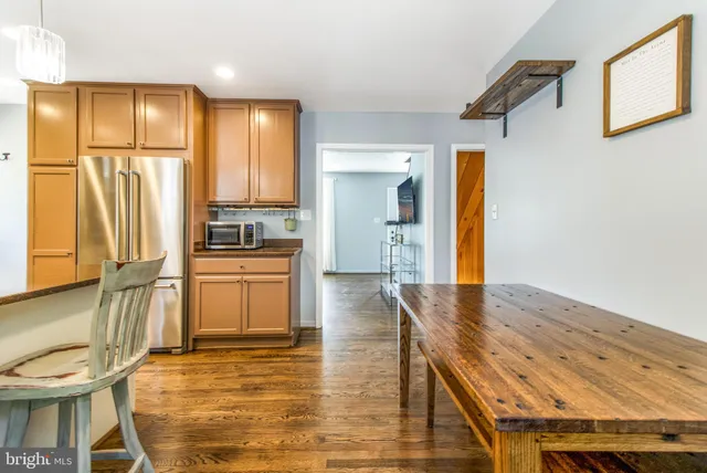 a view of a room with wooden floor and balcony