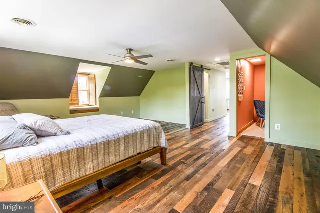 a utility room with a sink cabinets and washer