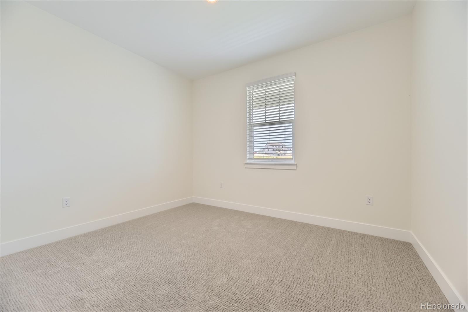 42974 Colonial Trail Elizabeth, CO 80107 - Photo 16 of 27 an empty room with a window