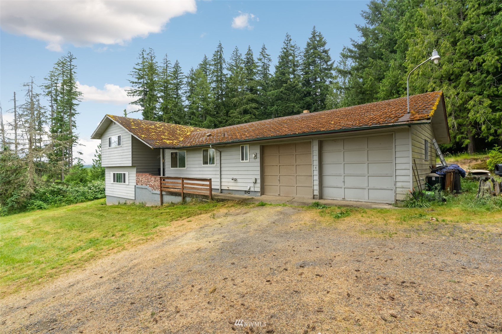 636 Jeffries Road Chehalis, WA 98532 - Photo 5 of 27 a house with trees in the background