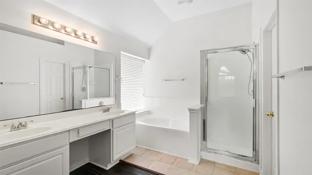 a bathroom with a double vanity sink mirror and double