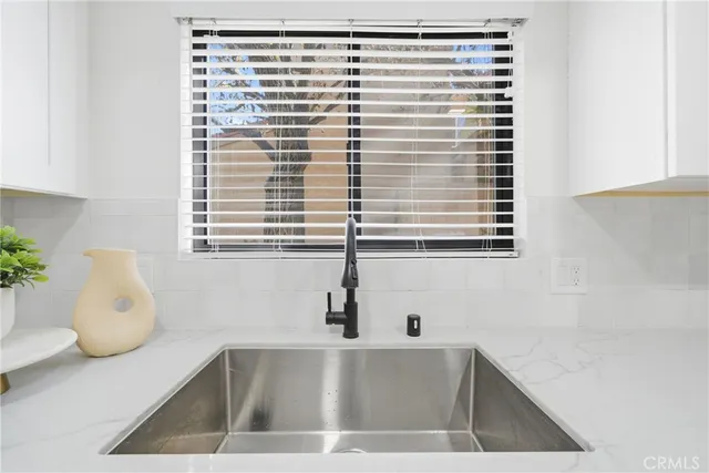 a close view of sink and mirror