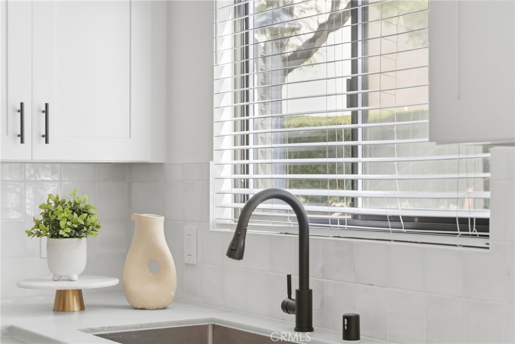 2714 Via Colina, Unit 12 Fullerton, CA 92835 - Photo 16 of 32 a close view of sink and mirror