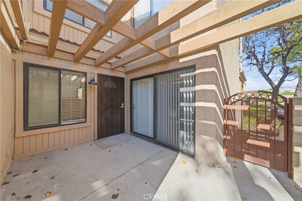 2714 Via Colina, Unit 12 Fullerton, CA 92835 - Photo 28 of 32 a view of a door with a glass door