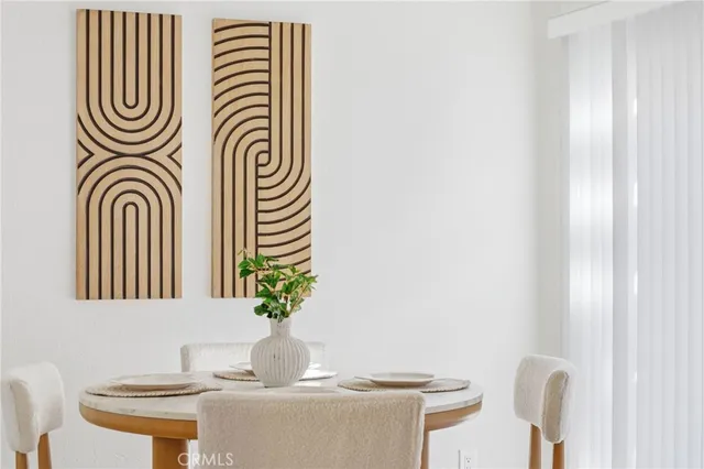 a bathroom with a sink a mirror and a toilet