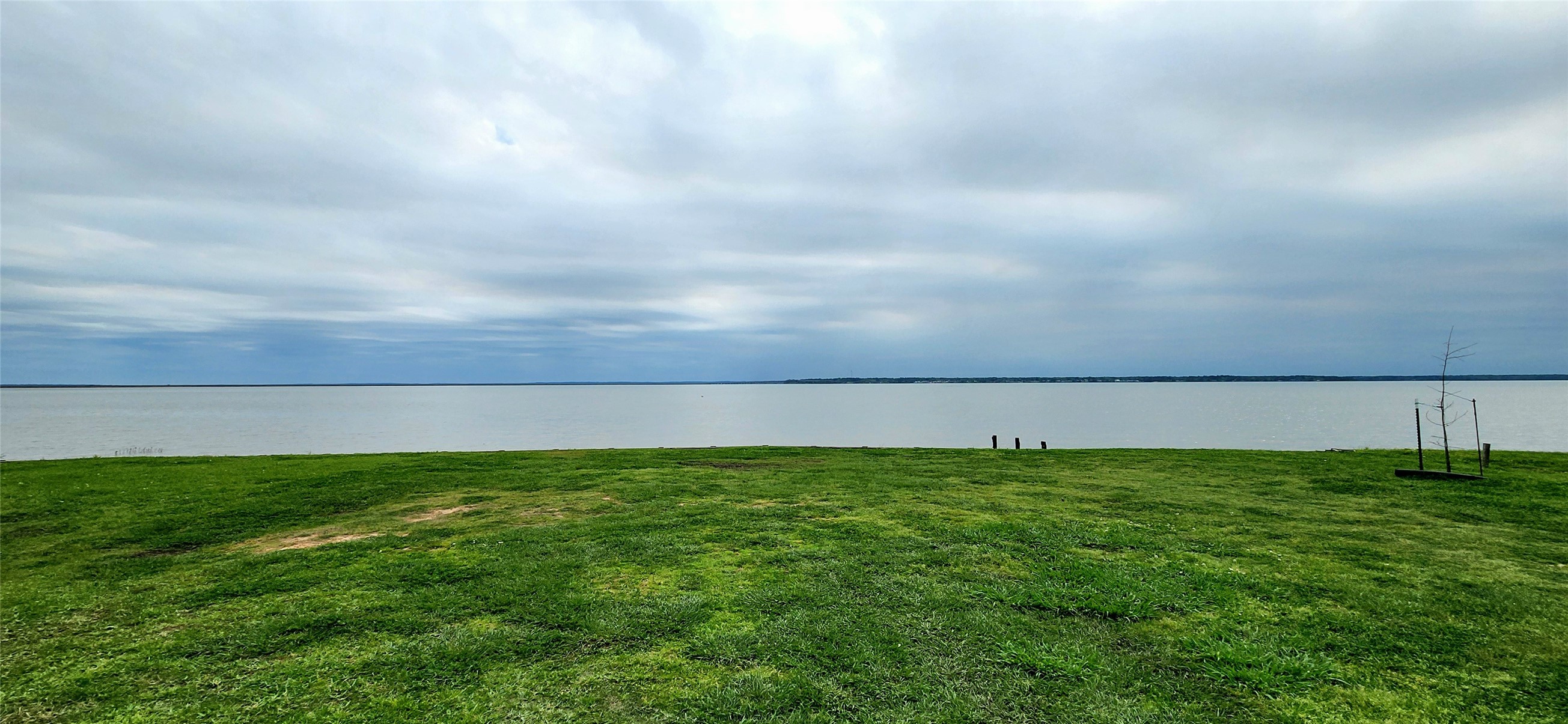 Tbd Angus Drive Onalaska, TX 77360 - Photo 2 of 6 a view of yard with swimming pool and wooden fence