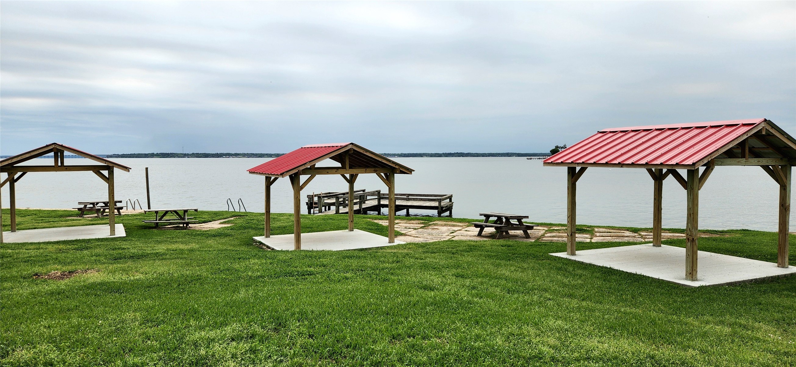 Tbd Angus Drive Onalaska, TX 77360 - Photo 4 of 6 a view of pool with table and chairs