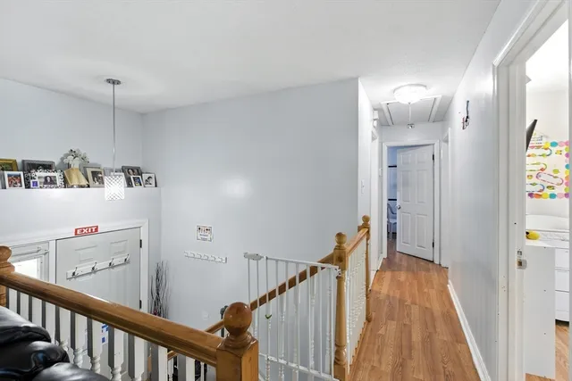 a view of a hallway view with staircase