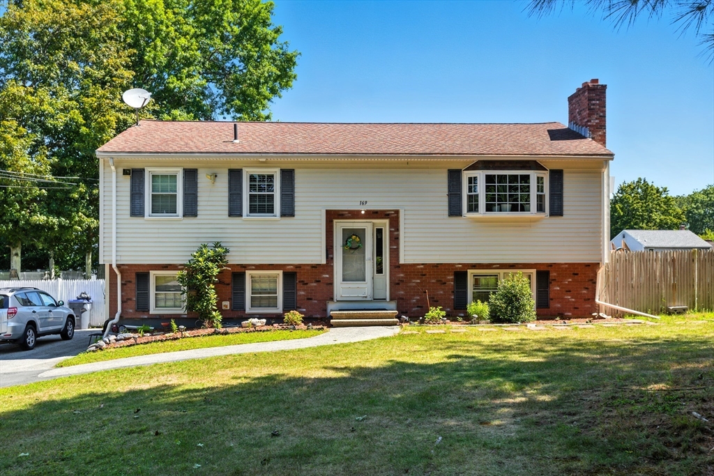 169 Berkeley Street Methuen, MA 01844 - Photo 2 of 31 a front view of a house with a yard