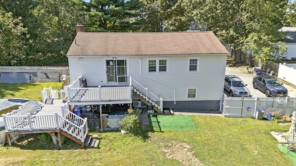 169 Berkeley Street Methuen, MA 01844 - Photo 28 of 31 a aerial view of a house with swimming pool and sitting area