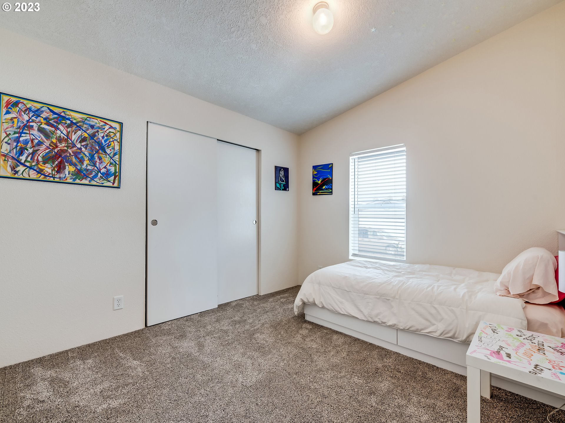 29720 Jeans Road, Unit 22 Veneta, OR 97487 - Photo 21 of 30 a bedroom with a bed and a window