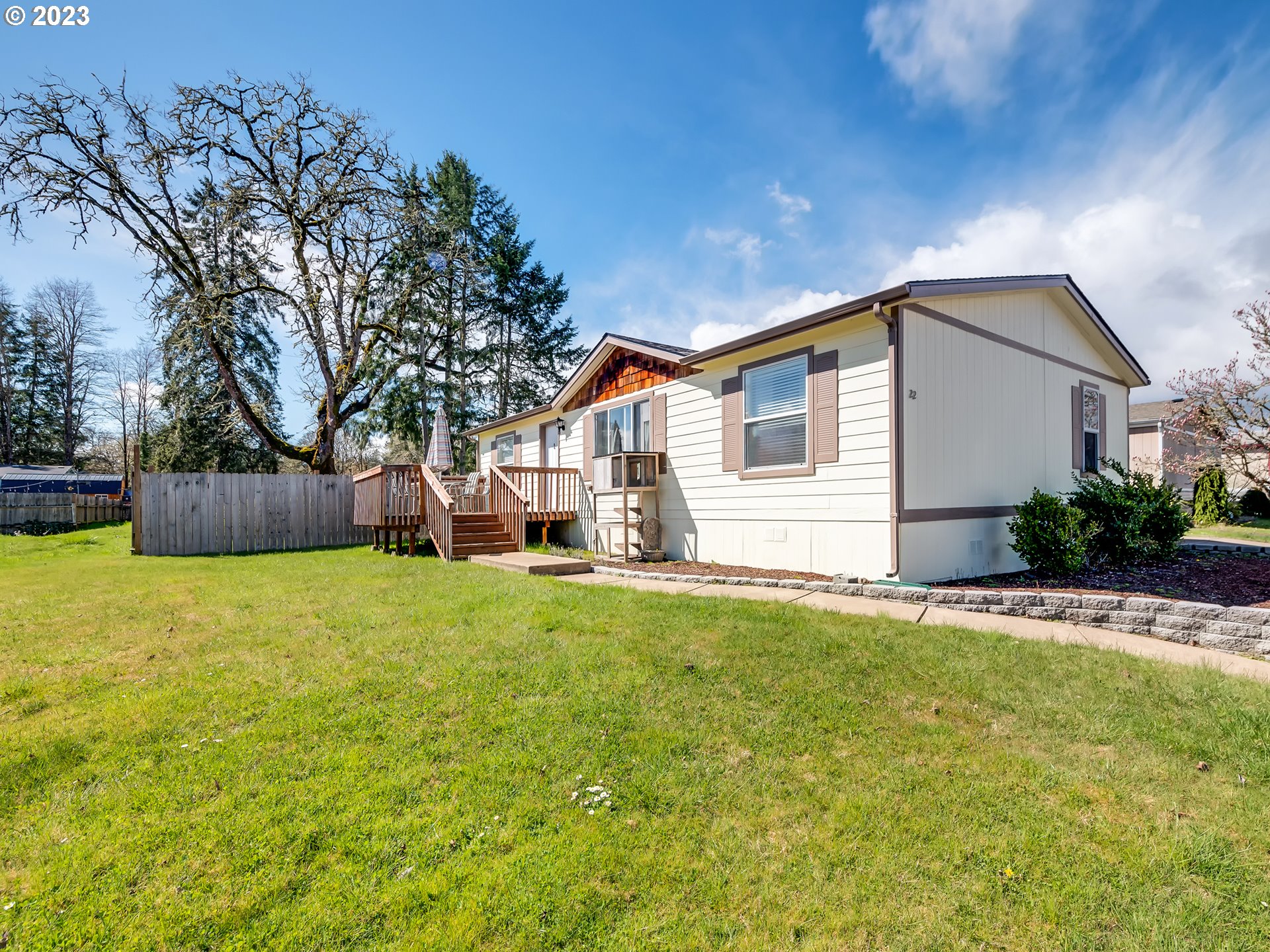 29720 Jeans Road, Unit 22 Veneta, OR 97487 - Photo 3 of 30 a front view of house with yard and green space