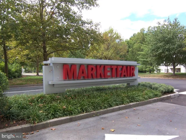 a view of outdoor space with seating area and trees