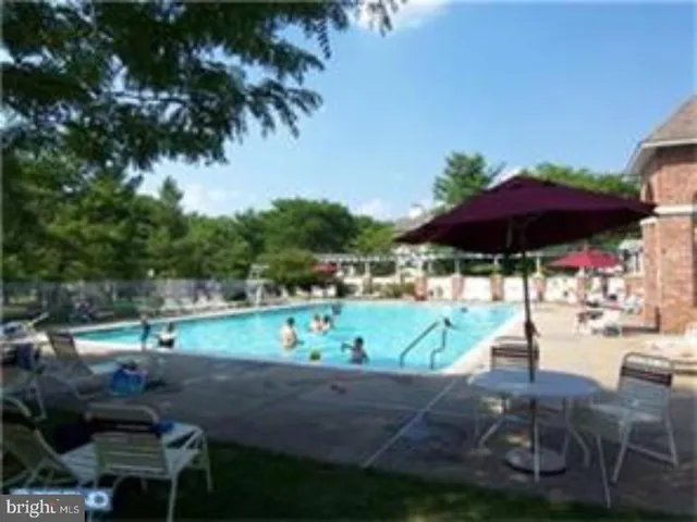 a view of a two chairs in the balcony