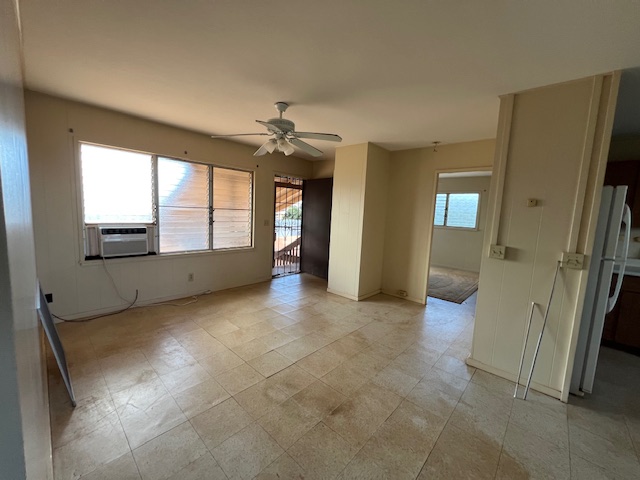 9622 Waena Road Waimea, HI 96796 - Photo 4 of 4 a view of an empty room with a fireplace and a window