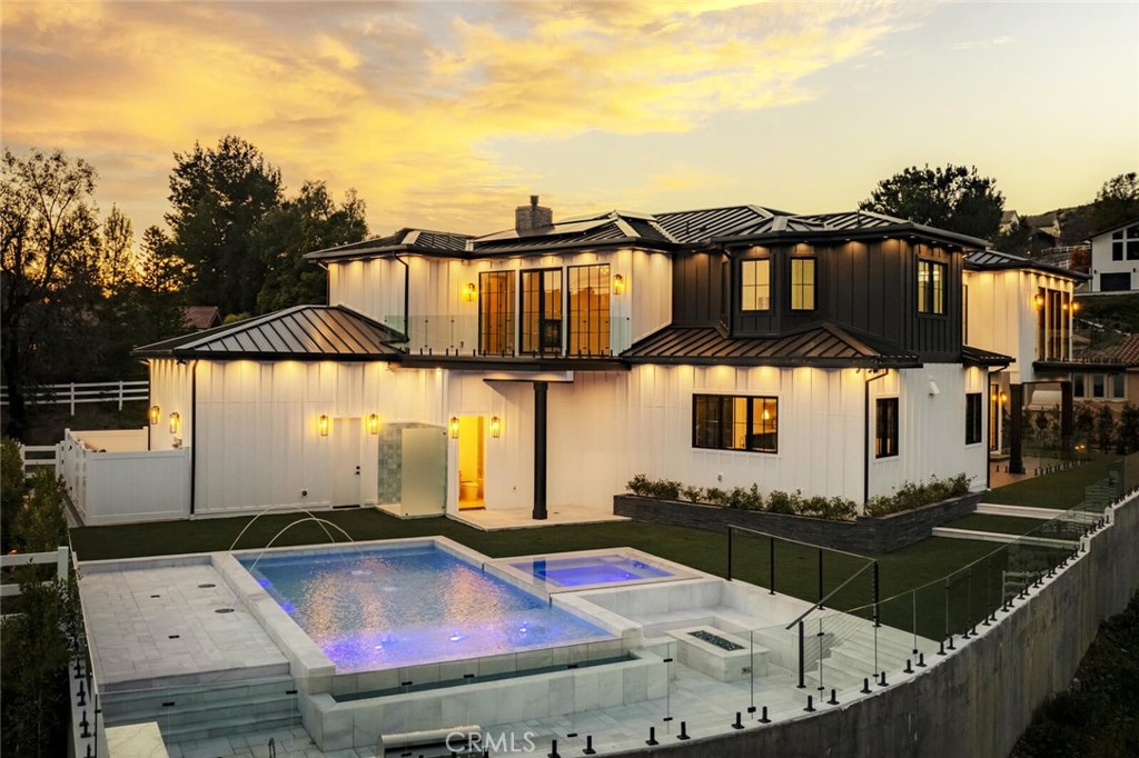 46 Dapplegray Road Bell Canyon, CA 91307 - Photo 1 of 1 an aerial view of a house with swimming pool and sitting area