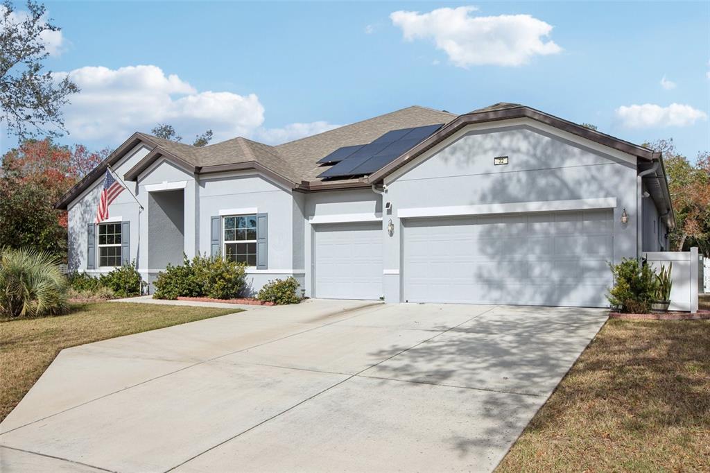 32 Birchtree Street Homosassa, FL 34446 - Photo 1 of 1 a view of a house with a yard