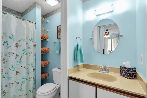 a view of a house with a yard and garage