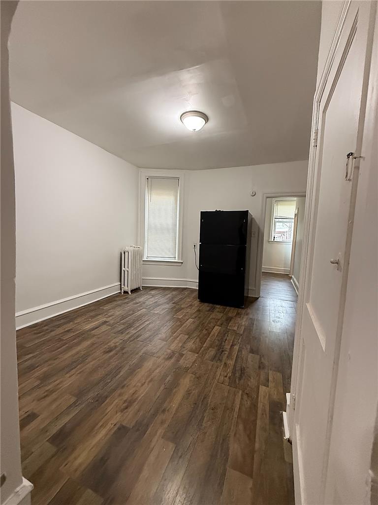 5107 Cottage Street, Unit 1 Philadelphia, PA 19124 - Photo 6 of 7 A versatile living space with robust flooring awaits your personal touch.