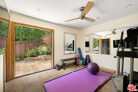 a room with furniture and a large window