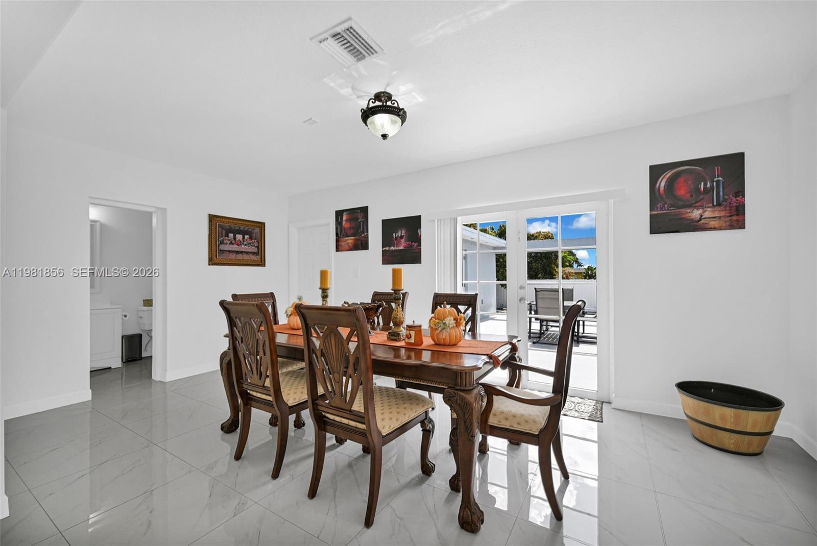756 West 53rd Street Hialeah, FL 33012 - Photo 15 of 65 a dining room with furniture and window