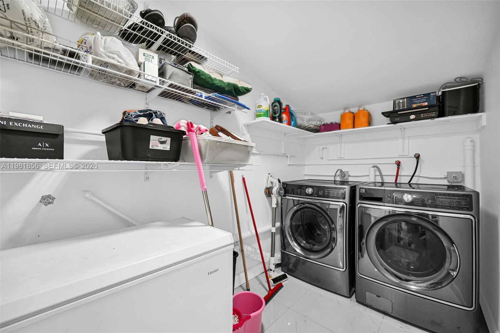 756 West 53rd Street Hialeah, FL 33012 - Photo 43 of 65 a utility room with dryer and washer