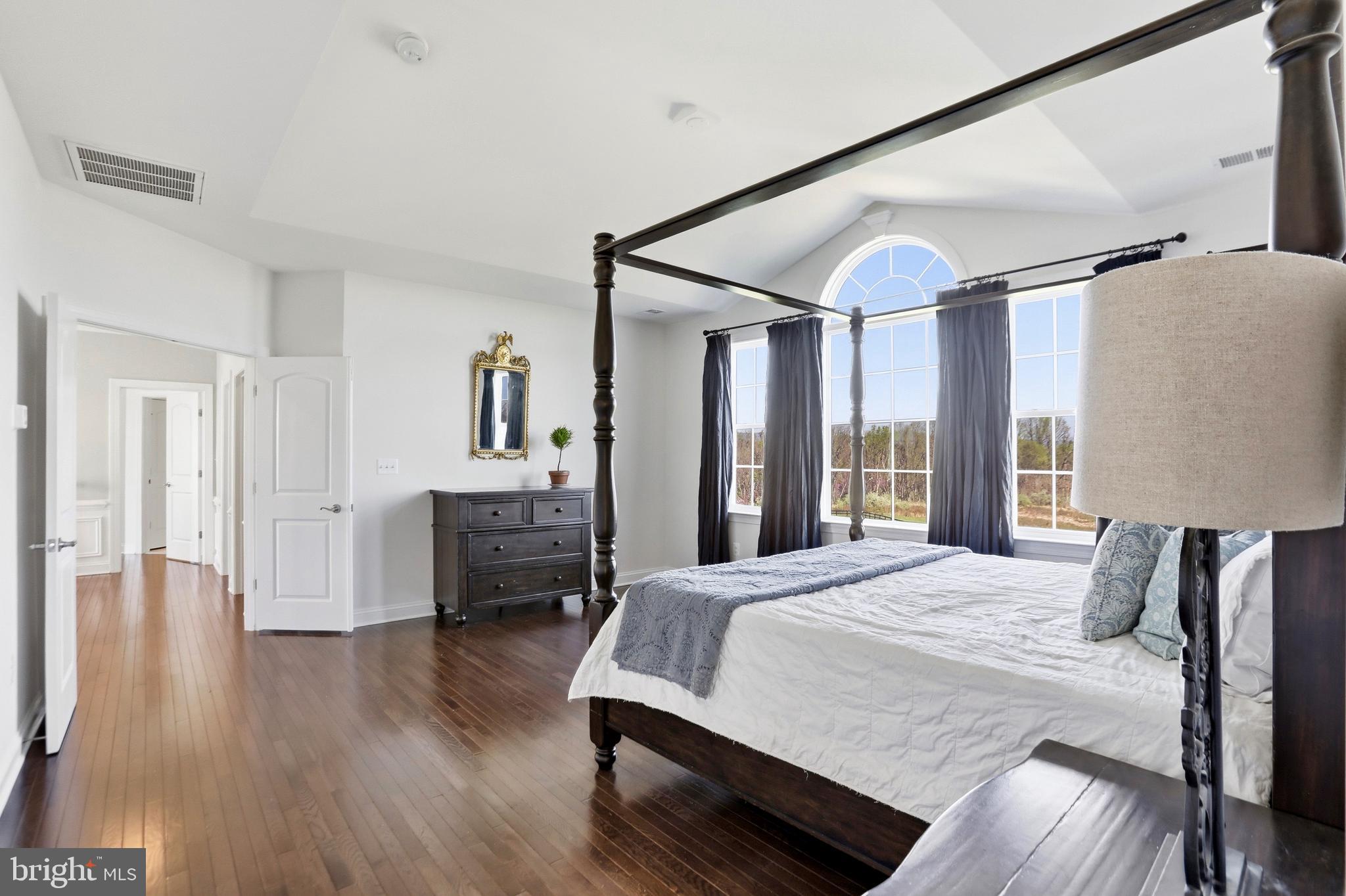 36972 Bridle Ridge Lane Purcellville, VA 20132 - Photo 26 of 44 a bedroom with a bed and a table