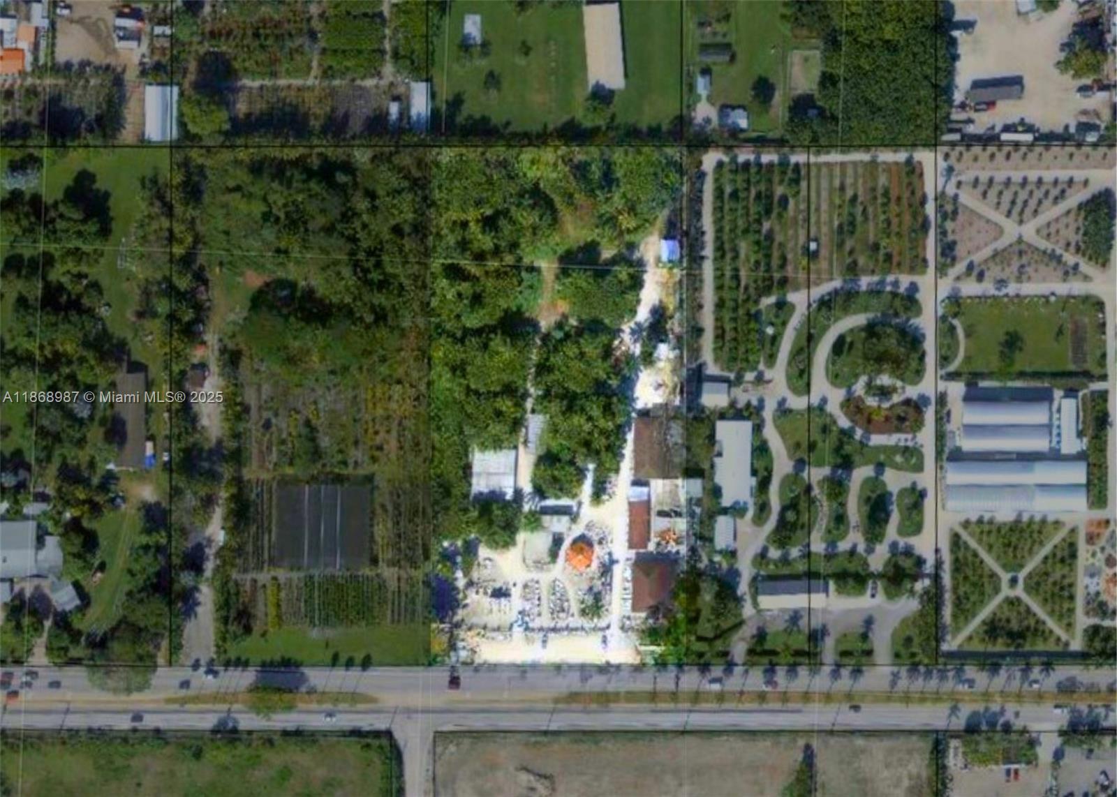 12475 Southwest 56th Street Miami, FL 33175 - Photo 3 of 3 an aerial view of a residential apartment building with a yard and plants