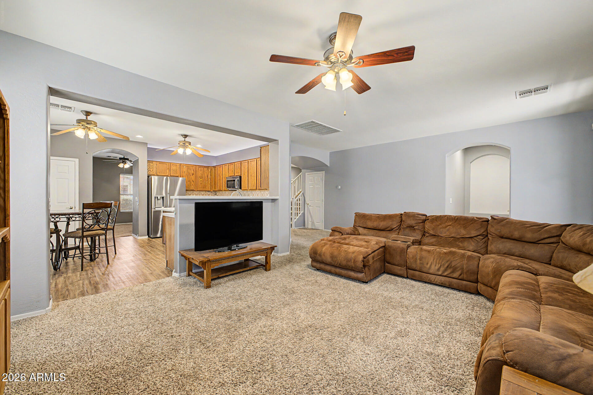 6622 West Harwell Road Laveen, AZ 85339 - Photo 7 of 32 a living room with furniture and a flat screen tv