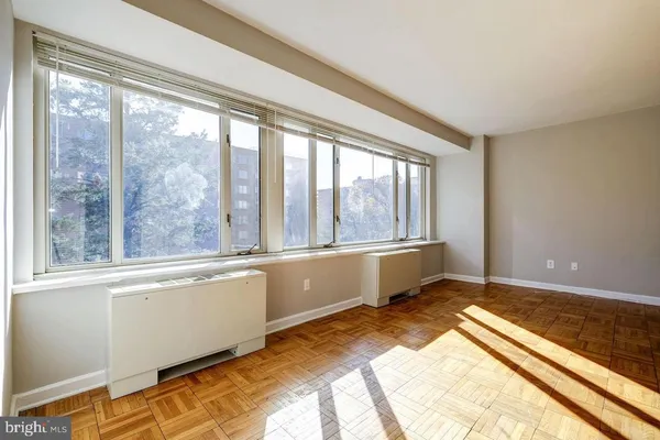 a view of a room with a large window