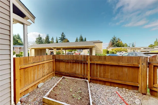 a view of a balcony with furniture