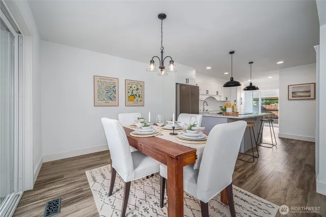 a view of a dining room with furniture