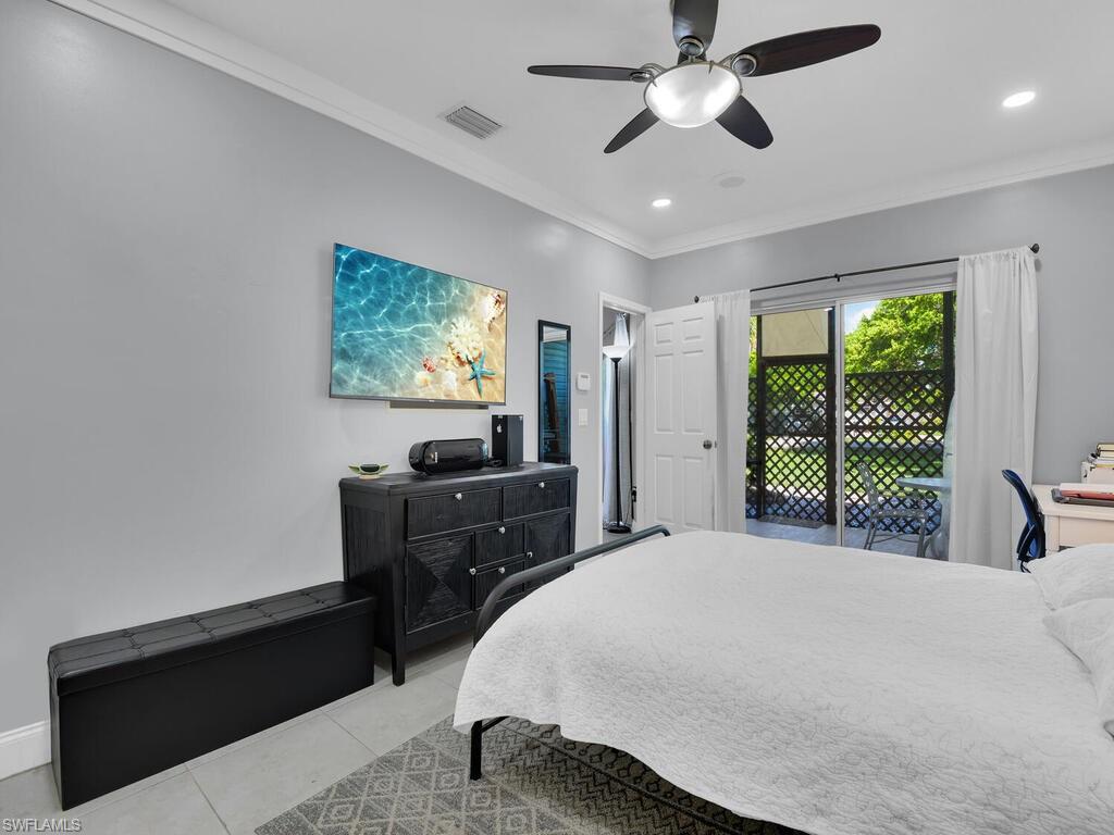 2160 43rd Terrace Southwest, Unit 49 Naples, FL 34116 - Photo 11 of 22 Master Bedroom