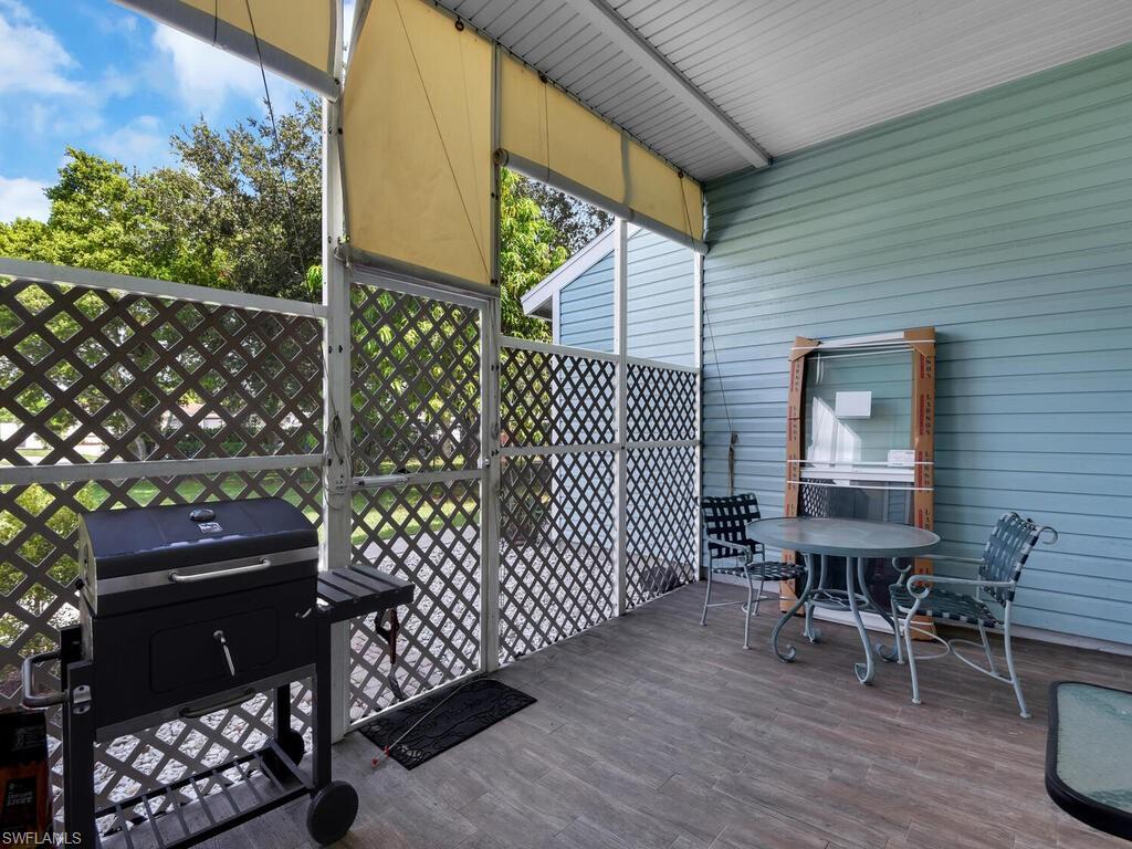 2160 43rd Terrace Southwest, Unit 49 Naples, FL 34116 - Photo 17 of 22 Screened Lanai
