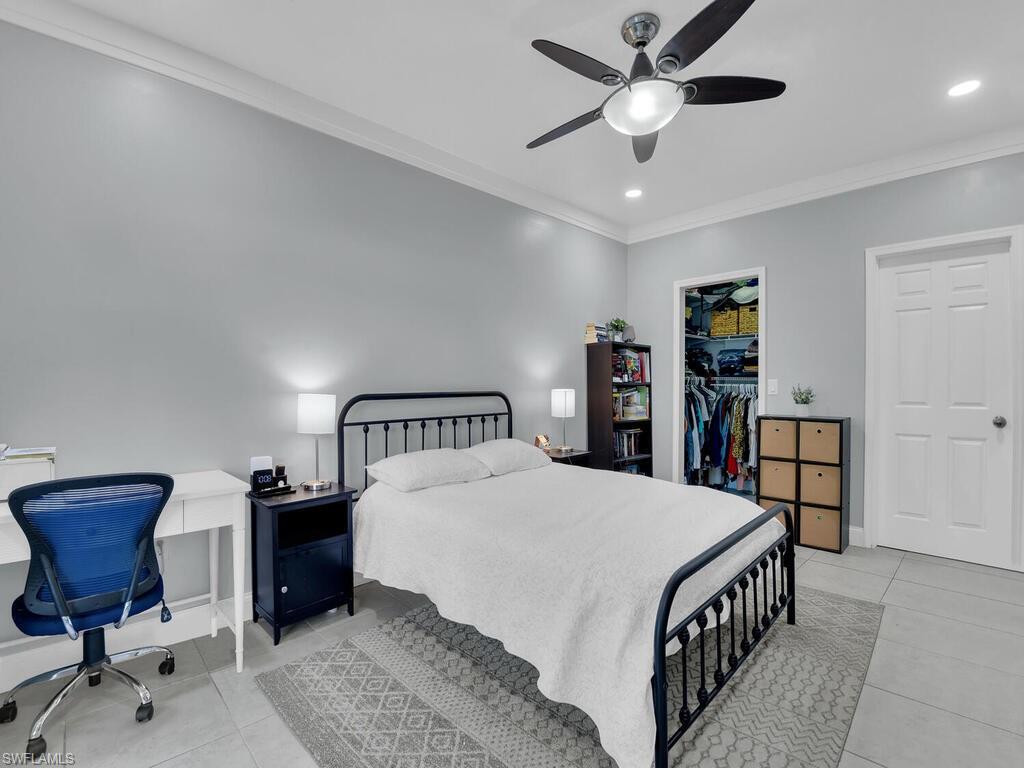2160 43rd Terrace Southwest, Unit 49 Naples, FL 34116 - Photo 10 of 22 Master Bedroom