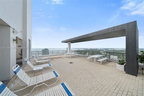 a view of roof deck with patio