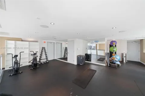 a view of a room with gym equipment