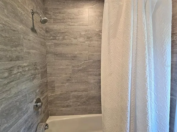 a bathroom with a bathtub