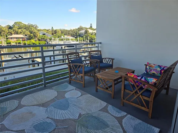 a view of a terrace with furniture