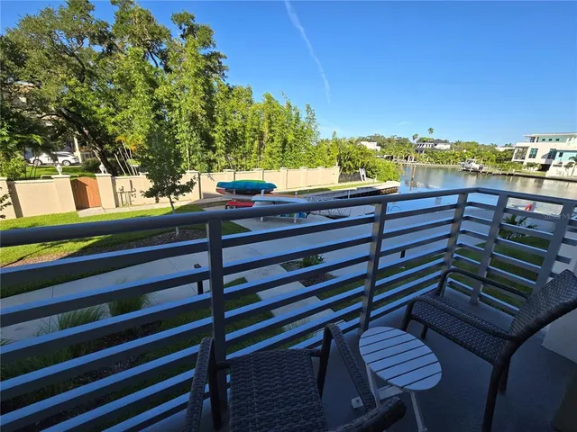 a view of a balcony with city view