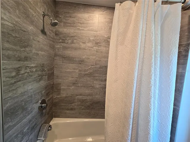 a bathroom with a bathtub