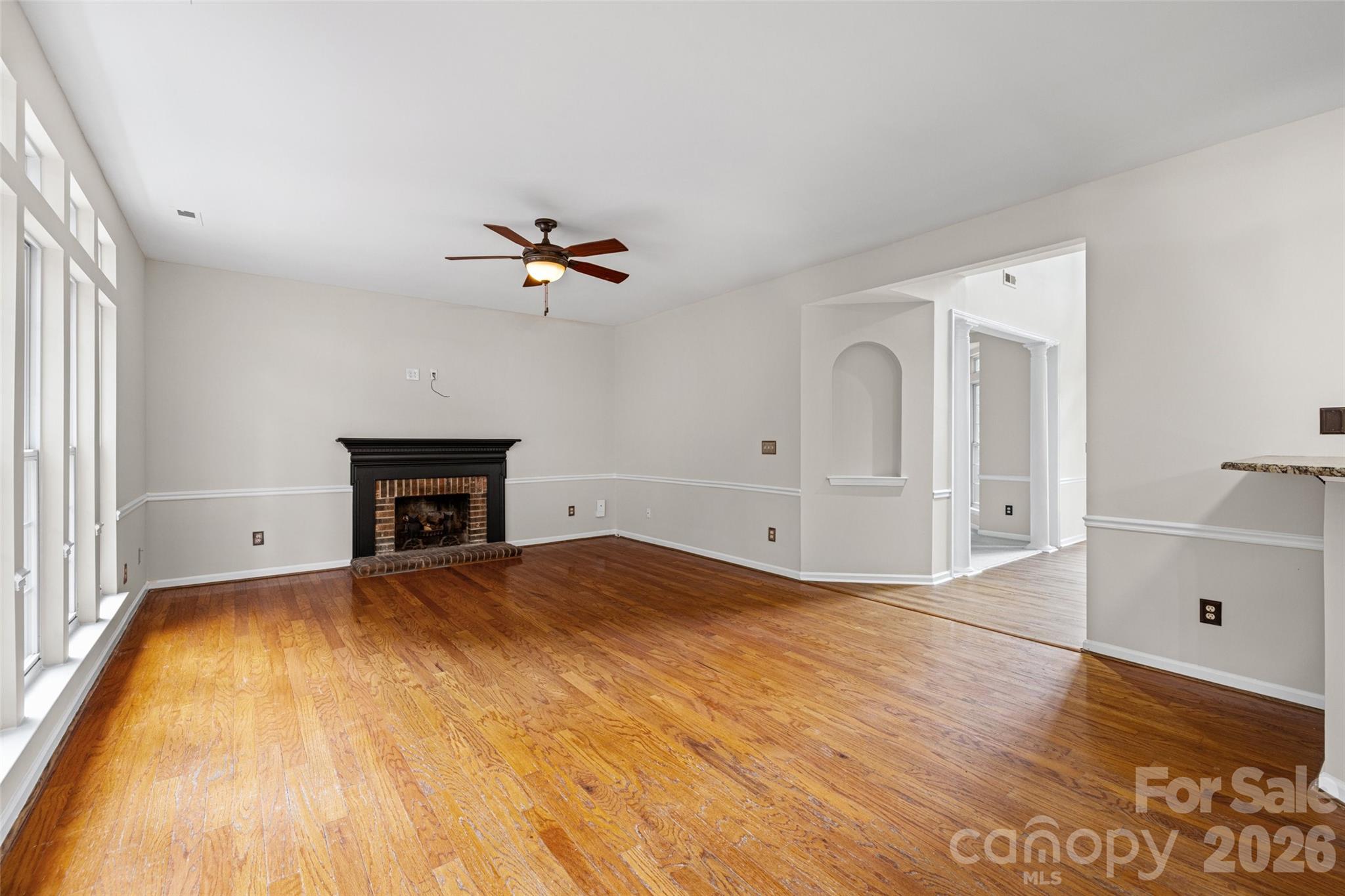 620 East Cheval Drive Fort Mill, SC 29708 - Photo 10 of 48 a view of empty room with wooden floor and fan