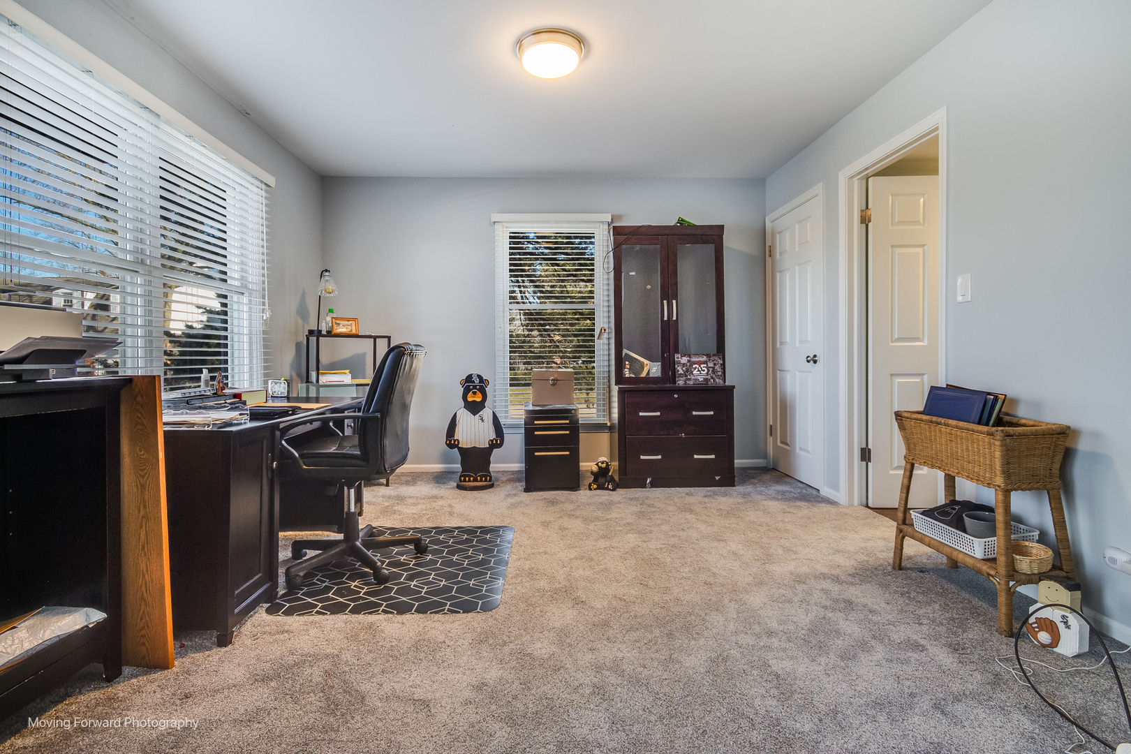 133 Rivershire Lane Lincolnshire, IL 60069 - Photo 8 of 26 a view of a workspace with furniture and a window