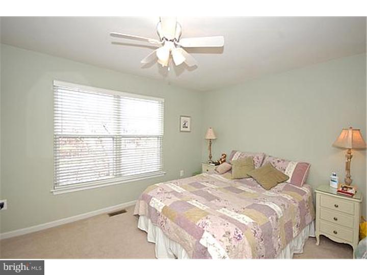 3 Sandstone Road East Windsor, NJ 08520 - Photo 18 of 24 a bedroom with a bed and a window